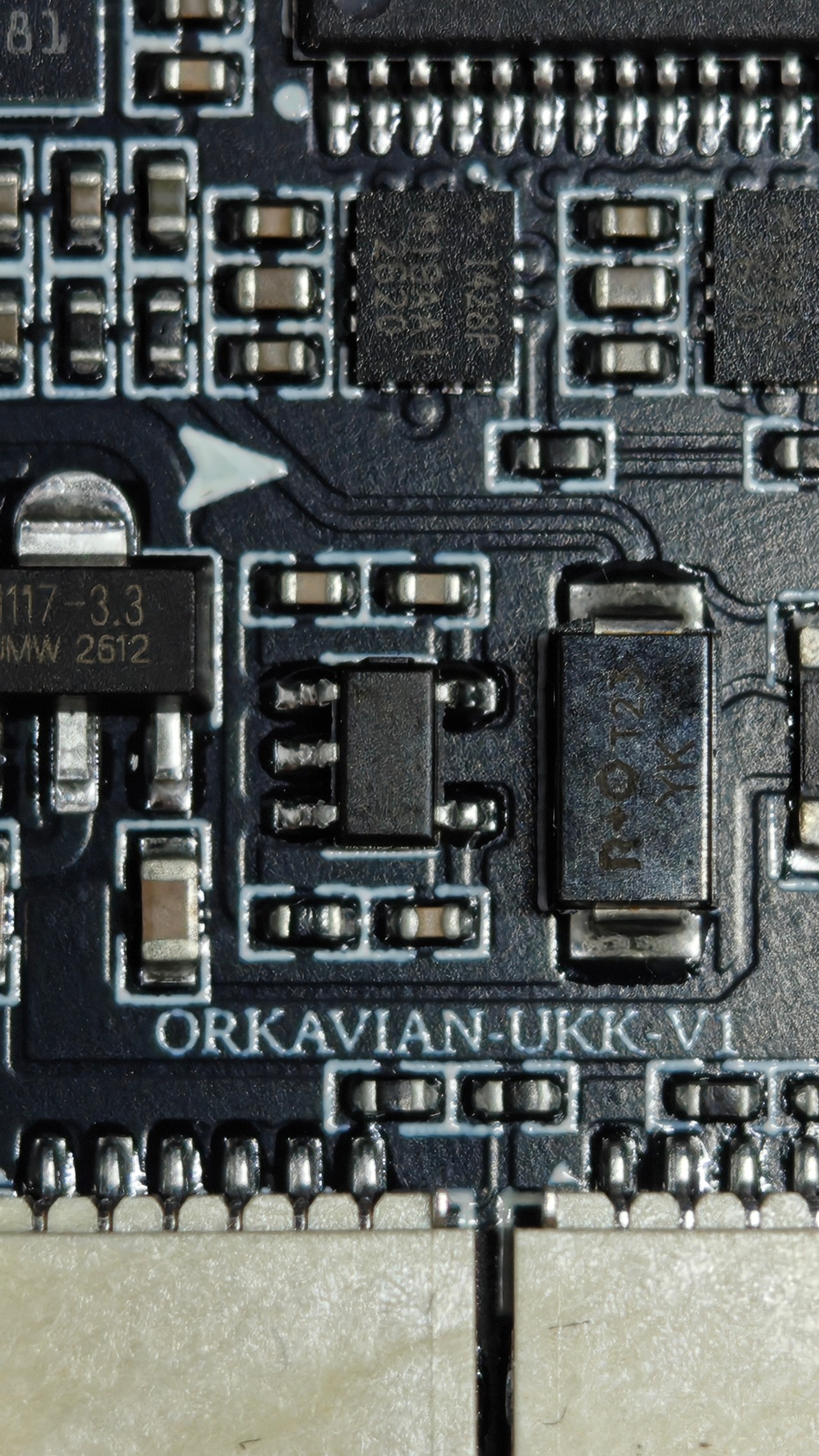 A macro view of the Orkavian UKK V1 board identifier and electronic components